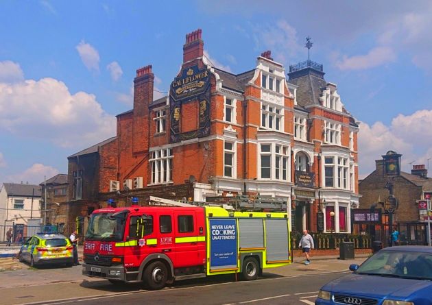 Firefighters tackled a blaze at the Cauliflower Pub in Ilford. 