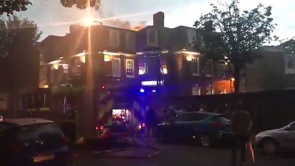 Fire visible on the roof of Grove House Pub causing damage to the 1st and 2nd floors.