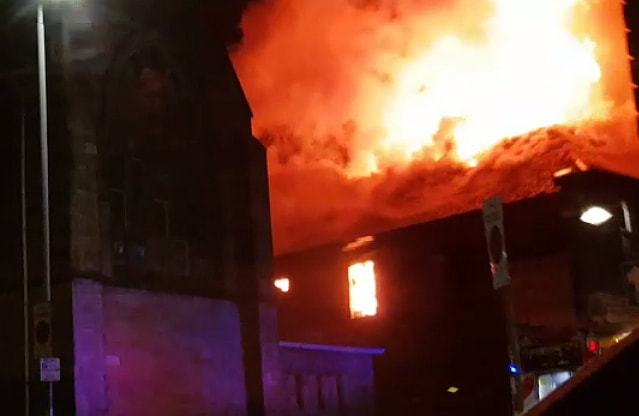 Image shows huge blaze ripping through building