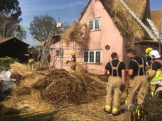 Firefighters had to tear away large parts of the newly installed thatch.