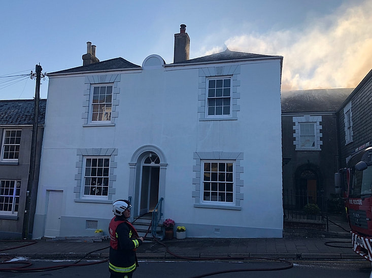 Firefighters at the large Georgian house in Modbury, South Hams, Devon.
