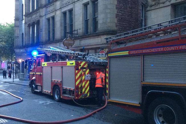 Firefighters responding to the incident at Caffe Grande, near Albert Square