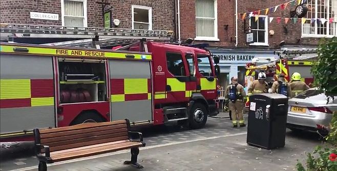 Homes and businesses in York city centre have been evacuated after a fire above a bakery. 