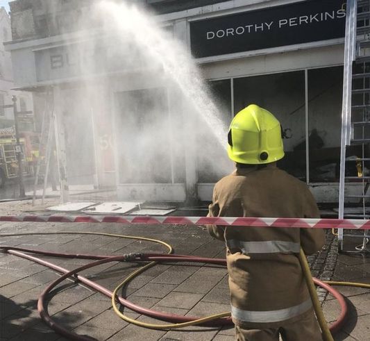 Photographs posted on Police Scotland's social media feeds show the shop was badly damaged in the fire. 