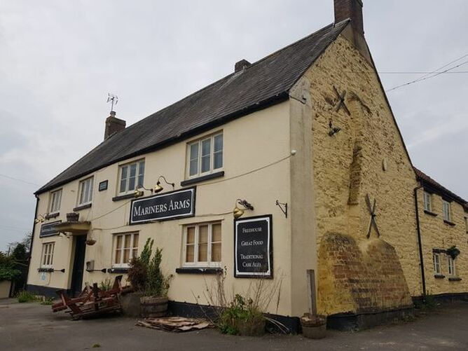A man has been arrested on suspicion of arson following a fire at the Mariners Arms in Berkeley.
