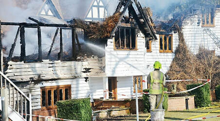 The thatched parts of the premises were severely damaged by fire.