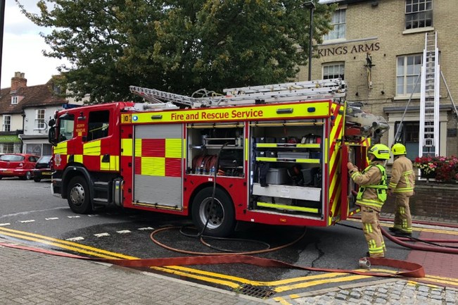 Firefighters at the scene of the blaze at the Kings Arms Pub