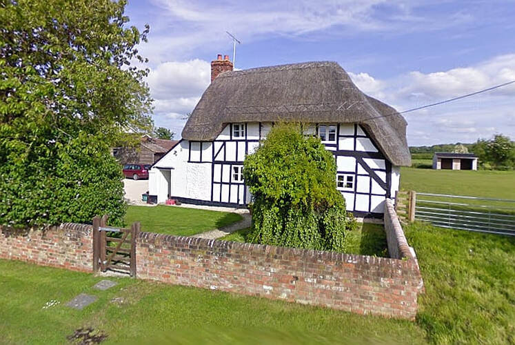 The pretty cottage before the fire (Credit: Google)