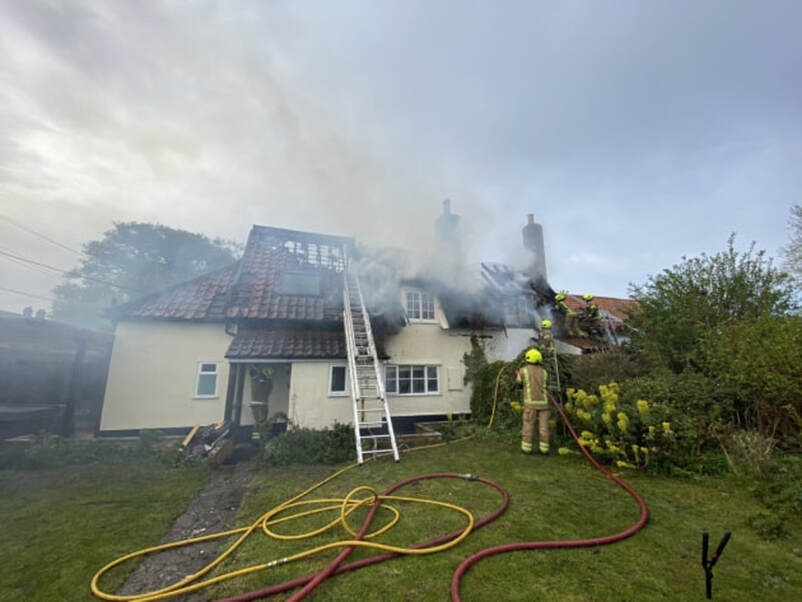 The fire tore through the roof of a thatched home in Stoke Ash Picture: IXWORTH FIRE STATION/SUFFOLK FIRE AND RESCUE SERVICE