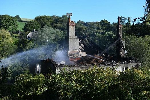 The fire burned for around 12 hours at the thatched roof property in Holbeton