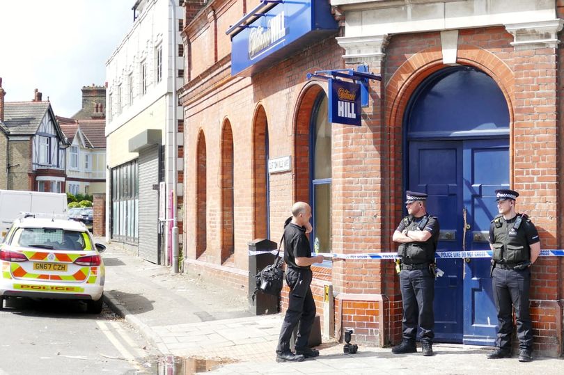 Officers outside William Hill in Margate (Image: Frank Leppard)