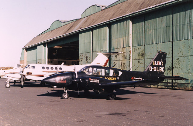 Aircraft parked outside hangars at Leavesden, 26 November 1989. © Martin Addison