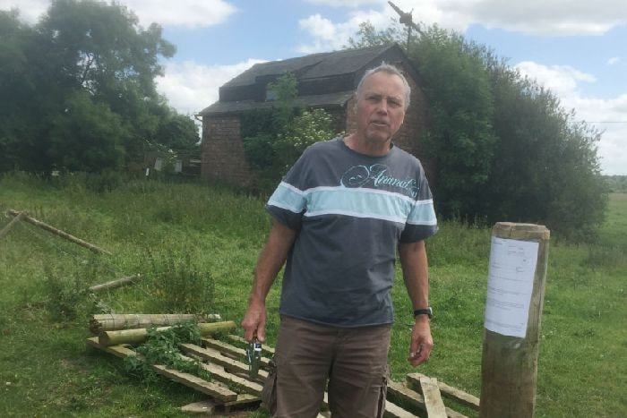 Alain Bonamy pictured last year at The Old Pump House at Asfordby which he hoped to convert into a family home and smallholding - it was destroyed in a fire late on Friday night
