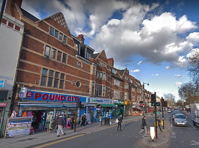 Barking Road is blocked near the junction with High Street North and High Street South due to the shop fire.