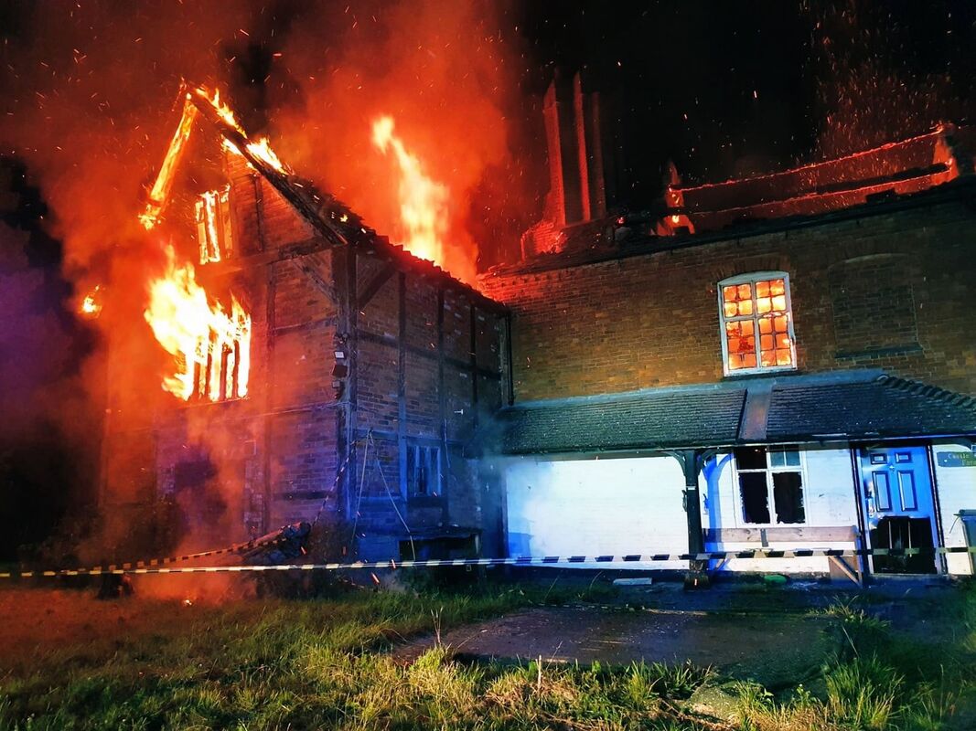 Dramatic pictures show the house consumed by flames.