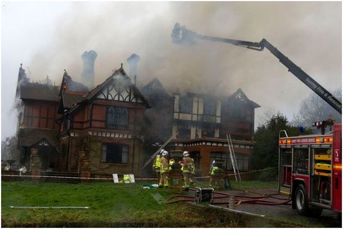 Fire crews tackle a blaze at Hambeldon House
