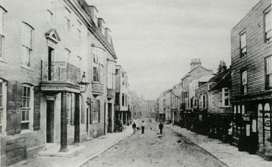 High Street, Rye in 1860, with The George Hotel on the left.