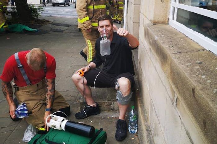 Matt Snelling receiving treatment following the fire at Jo and Cass.