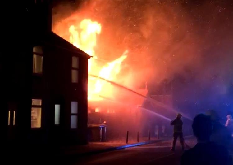Crews tackle the raging fire in Canterbury Road, Faversham. (Picture: Ioan Saul)