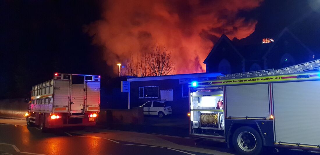The fire rages just a few metres behind the historic building of Old Goole Working Men’s Club.