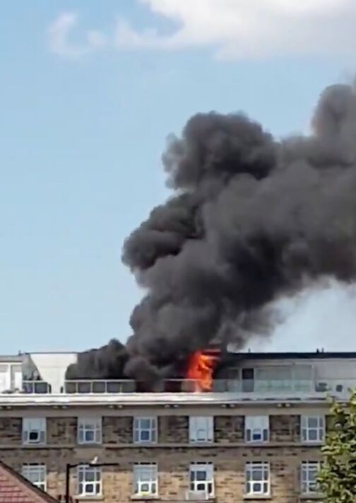 East Acton fire: Black plumes of smoke are billowing from the scene (Image: TWITTER)