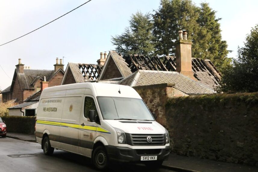 A fire and rescue van outside the fire-hit home on Albert Street, Alyth (Image: DC Thomson)