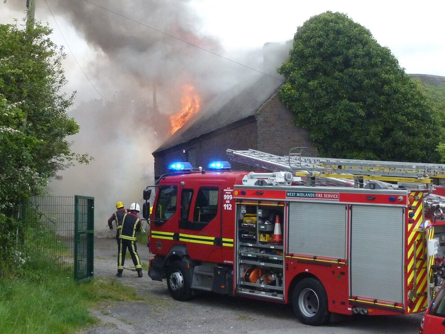 Firefighters tackling the blaze. (Photo: Peter Smith)