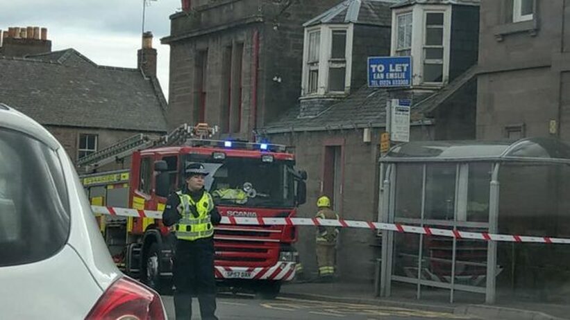 Firefighters rushed to put out a blaze in a property on a busy Brechin street 