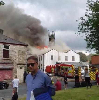 The former mill on fire