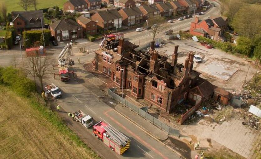 The remains of the former Green Dragon after the fire