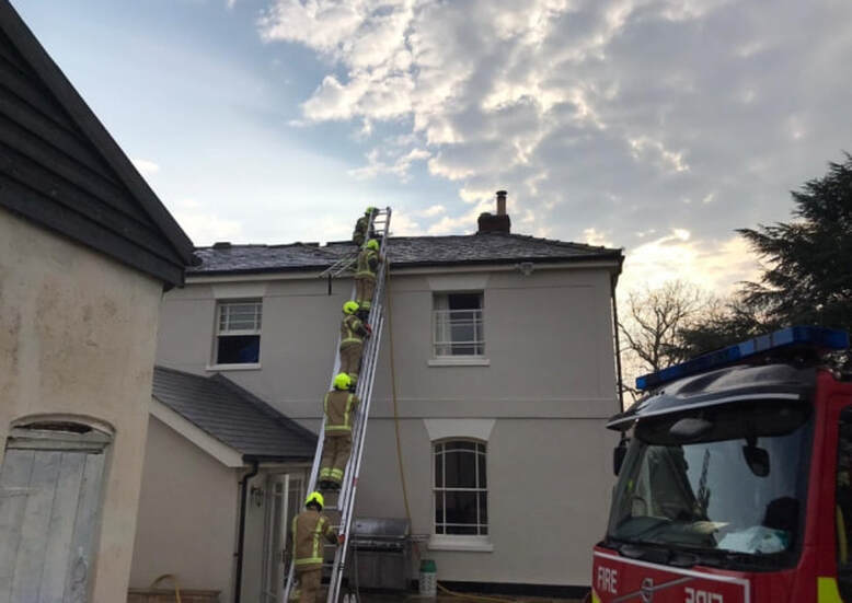 Firefighters have been tackling a blaze that started in the roof of Hawstead Hall in west Suffolk Picture: SUFFOLK FIRE AND RESCUE SERVICE