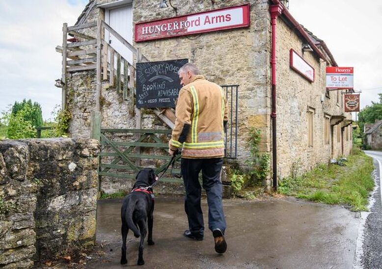 A fire fighter at the scene of the fire at the former Hungerford Arms (Image: Artur Lesniak)