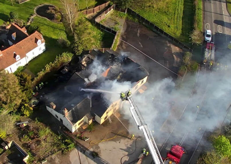 Drone footage shows the blaze at the Lion pub in Leavenheath. Picture: SUFFOLK FIRE AND RESCUE