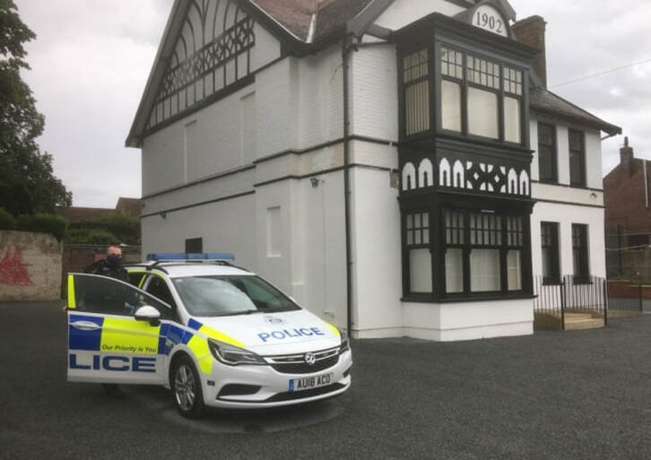 Police at the new mosque site in Aylsham Road Norwich. Picture: Simon Parkin
