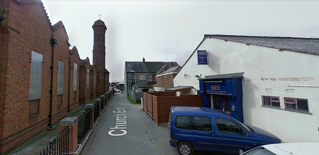 The old Riley's snooker hall, where the fire started, is just across the lane from the church