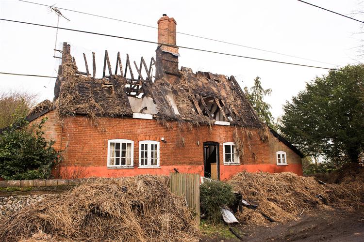 The badly damaged cottage following the fire